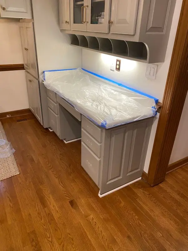 Built-in desk with counter masked in plastic and blue tape, Brentwood, TN