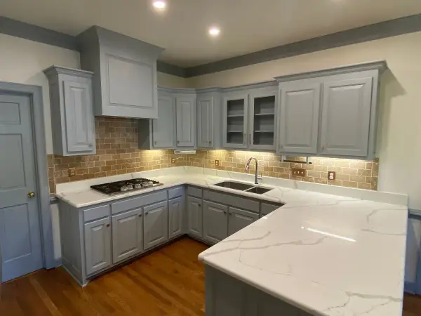 Finished gray U-shaped kitchen with tile backsplash and glass uppers, Brentwood, TN