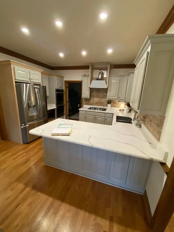 Gray painted peninsula and cabinets with white quartz counters, Brentwood, TN