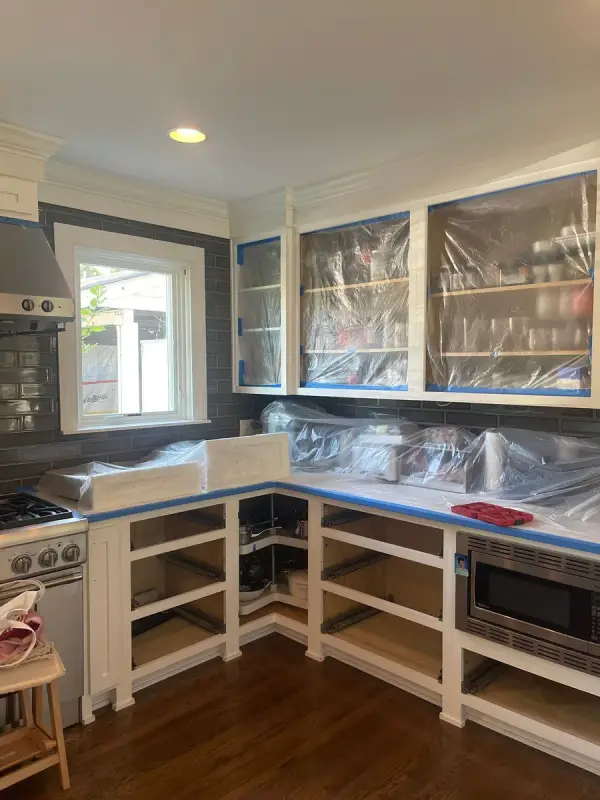 Open cabinet boxes and masked glass uppers mid-project, Brentwood, TN