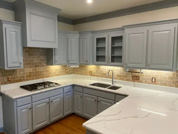 U-shaped run of gray cabinets with glass-front uppers, Brentwood, TN