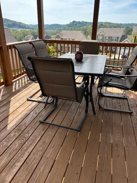 Stained deck boards under a patio set, Bellevue, TN