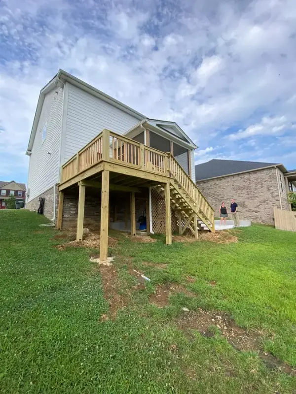 New bare-wood deck and stair seen from the yard, Bellevue, TN