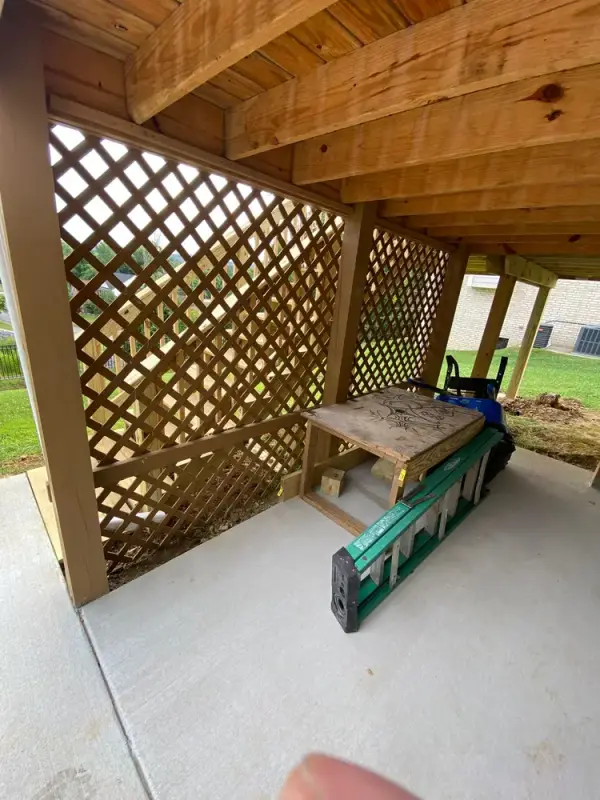 Bare-wood lattice and framing under the deck, Bellevue, TN