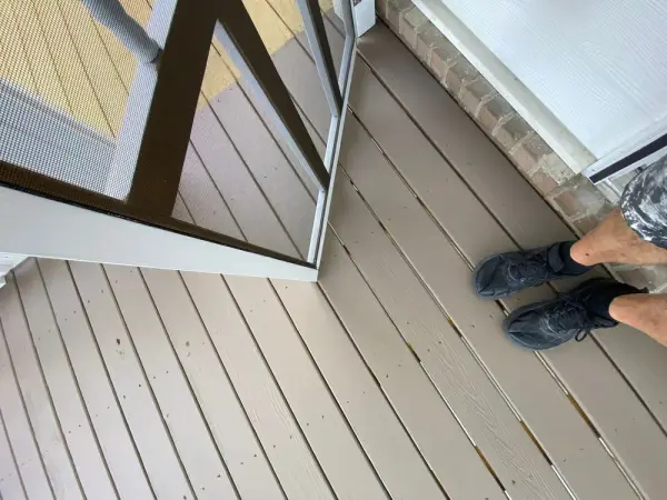 Brown-gray deck boards beside a screened wall, Bellevue, TN