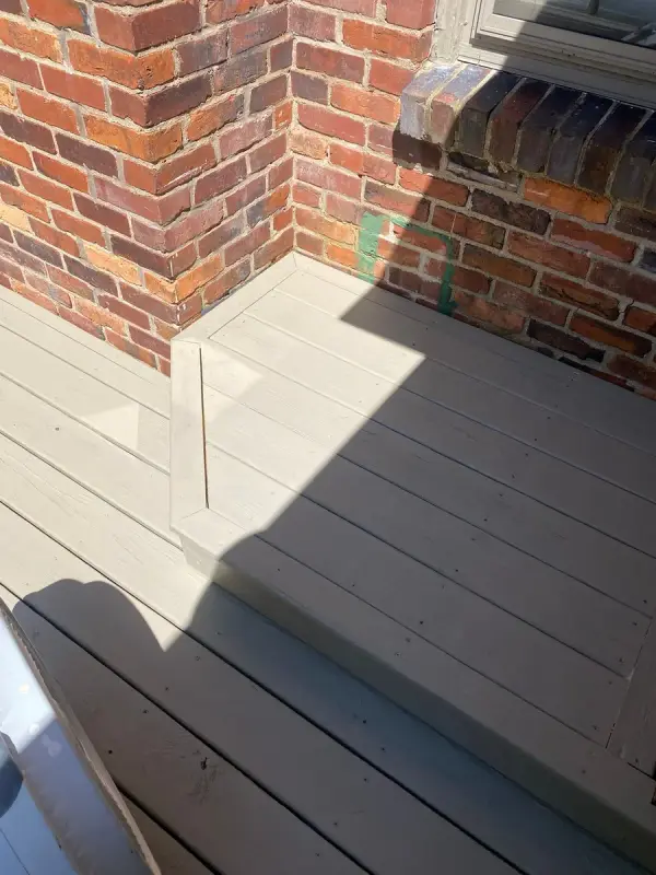 Gray-taupe stained step down to a deck landing, Belle Meade, TN