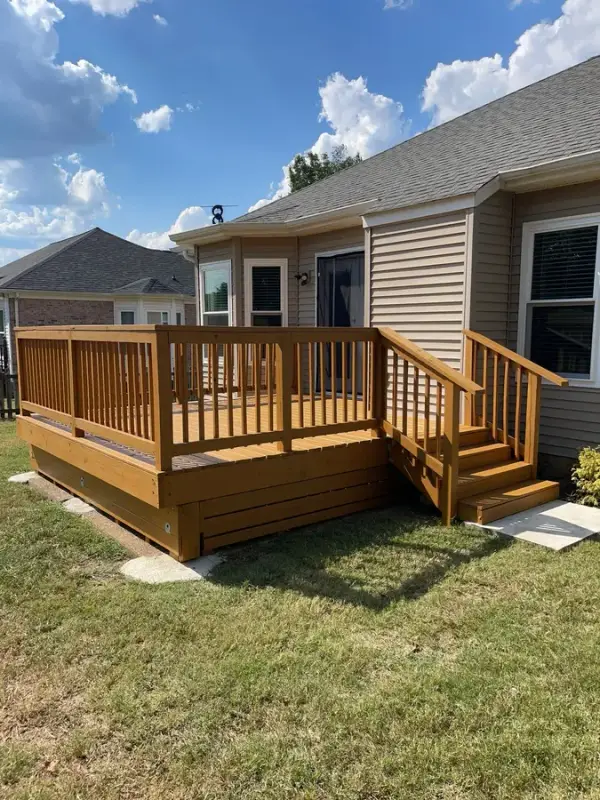 Stained deck and stair down to a concrete pad, Bellevue, TN