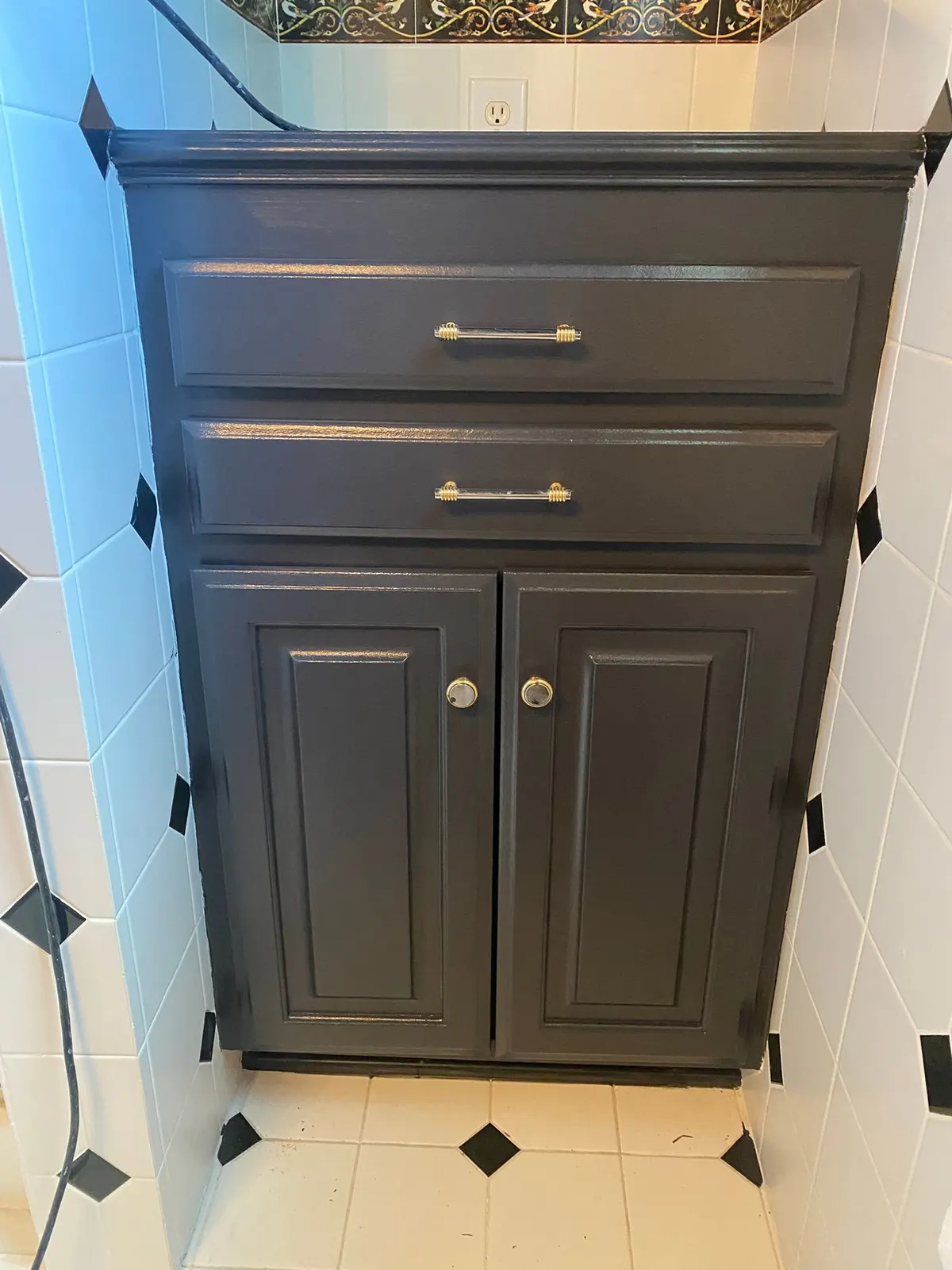Dark charcoal vanity with raised-panel doors and nickel pulls, Franklin, TN