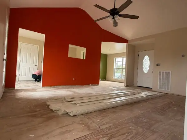 Burnt orange wall with an interior window and ceiling fan, Pleasant View, TN