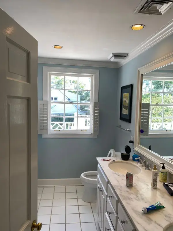 Bathroom with soft blue walls and white vanity, Belle Meade, TN