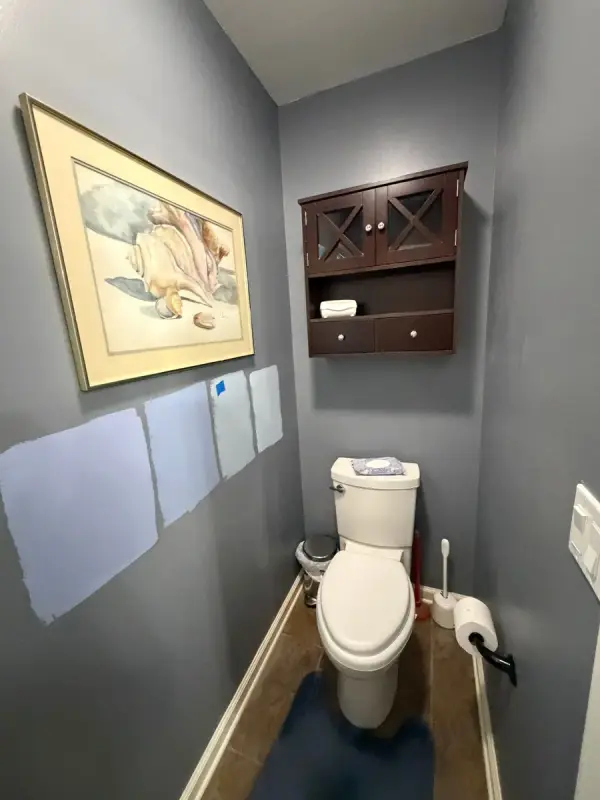 Gray powder room with paint samples on the wall, Brentwood, TN