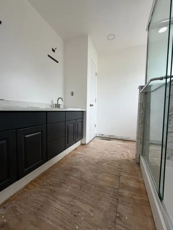Dark charcoal vanity in a white bathroom, Pleasant View, TN