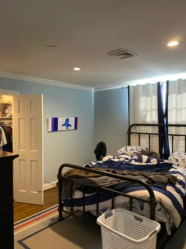 Bedroom with soft blue walls and white door, Belle Meade, TN