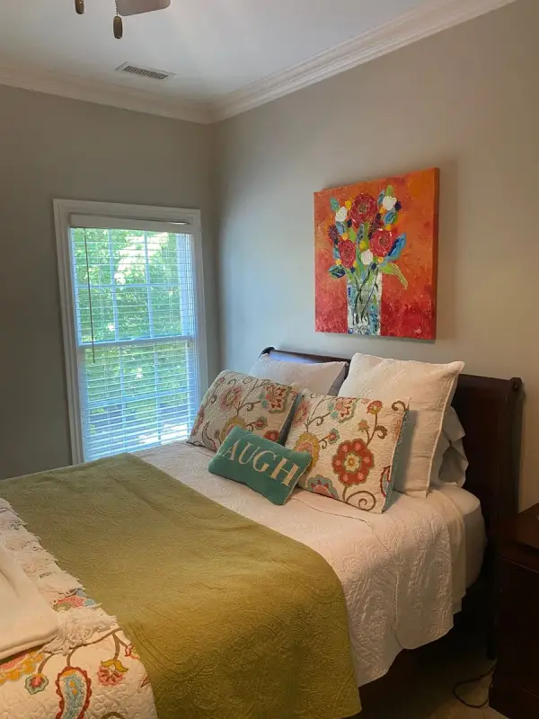 Bedroom with greige walls and white window trim, Brentwood, TN