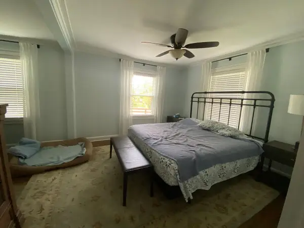 Pale blue-gray bedroom with white trim, wide view, Fairview, TN