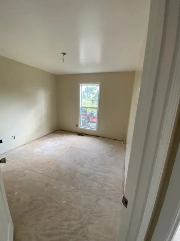 Cream bedroom with white trim and single window, Pleasant View, TN