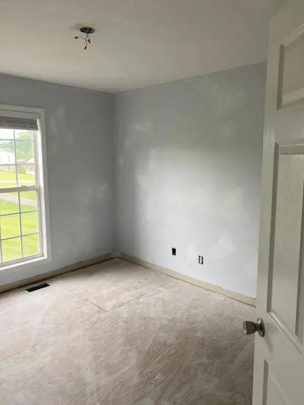 Light gray bedroom with patch spots on the walls, Pleasant View, TN