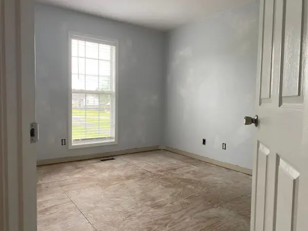 Light gray bedroom with patch spots, Pleasant View, TN