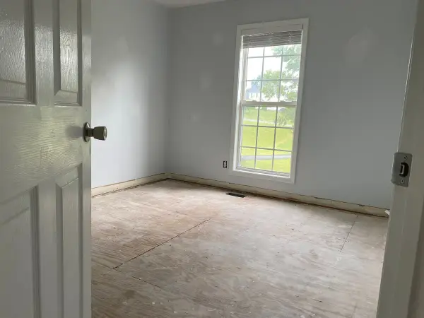 Light gray bedroom with patch spots, second angle, Pleasant View, TN