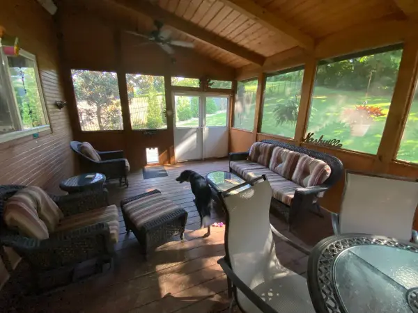 Screened sunroom with a wood plank ceiling, Bellevue, TN