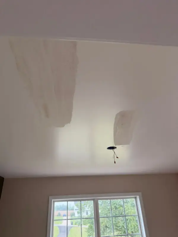 Ceiling patched with compound above a window, Pleasant View, TN