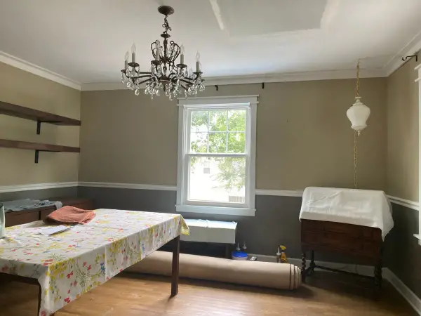 Dining room with dark gray lower walls and tan upper walls, Fairview, TN