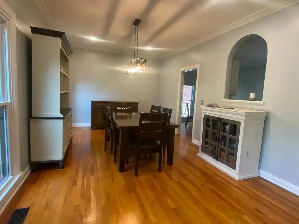 Dining room with light gray walls and an arched niche, Franklin, TN