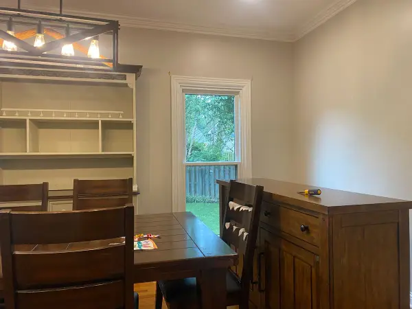 Dining area with a white built-in hutch and gray walls, Franklin, TN