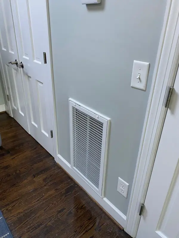White double doors and trim beside a pale gray-green wall, Belle Meade, TN