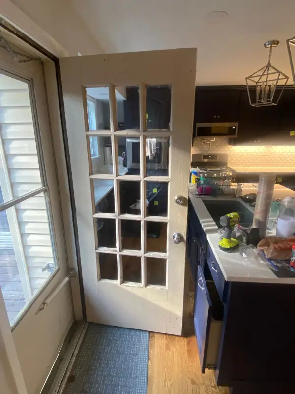 White French door with divided glass panes, open, Bellevue, TN