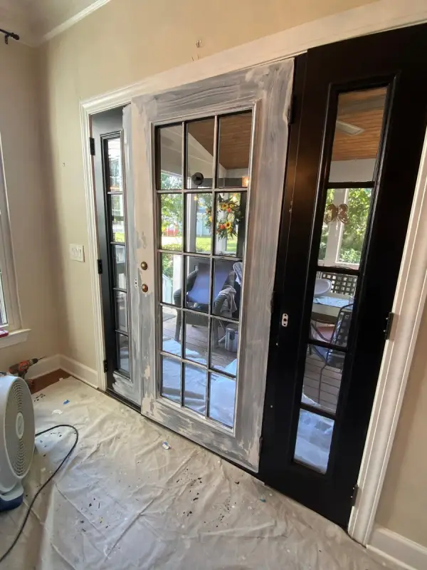 French door primed light gray, floor under drop cloths, Bellevue, TN