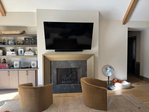 White fireplace surround with dark tile and built-in shelves, Belle Meade, TN