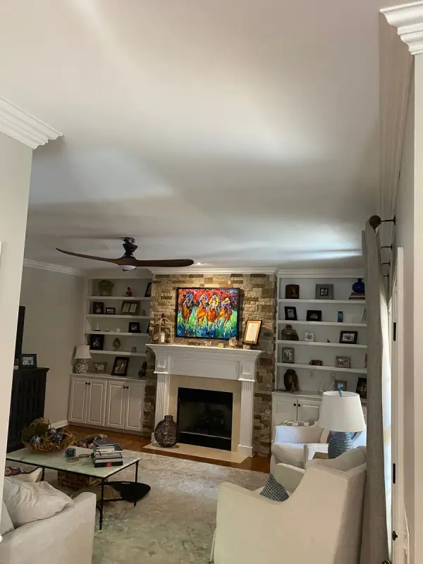 Family room with stone fireplace, white mantel and built-ins, Brentwood, TN