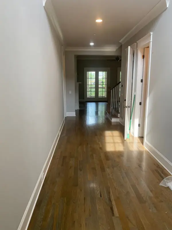 Long hallway with light gray walls and white baseboards, Belle Meade, TN