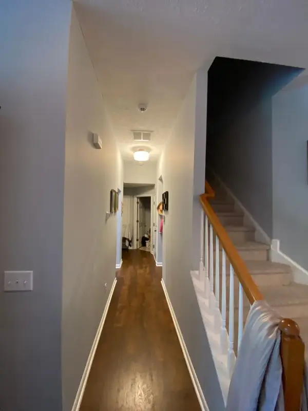 Gray hall beside a white-spindled staircase, Bellevue, TN