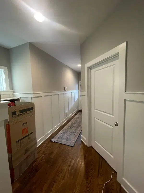 Hallway with white board-and-batten wainscoting and gray walls, The Nations, Nashville, TN