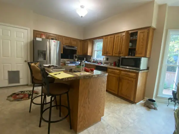 Kitchen with oak cabinets and warm beige walls, Bellevue, TN