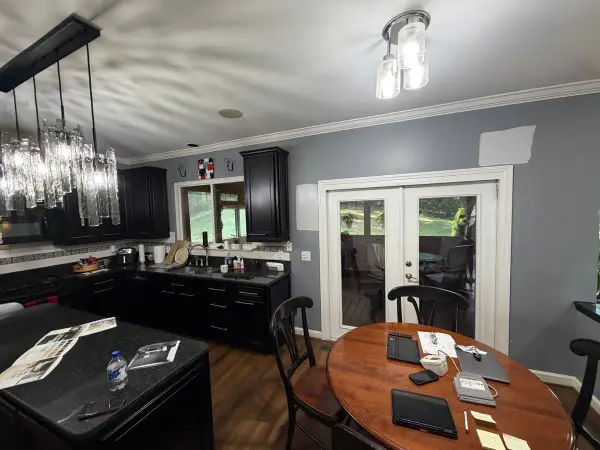 Gray walls around black kitchen cabinets and French doors, Bellevue, TN