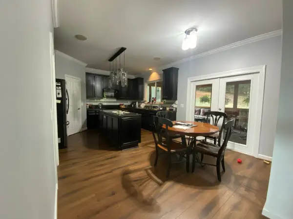 Gray-walled breakfast area by white French doors, Bellevue, TN