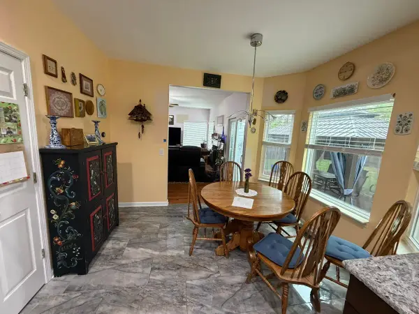 Butter-yellow breakfast nook with bay windows, Brentwood, TN