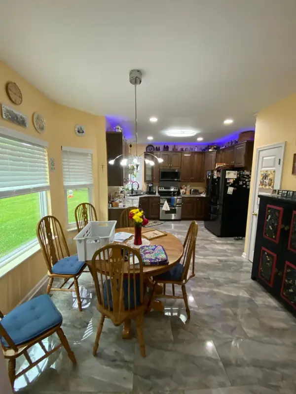 Butter-yellow breakfast area facing the kitchen, Brentwood, TN