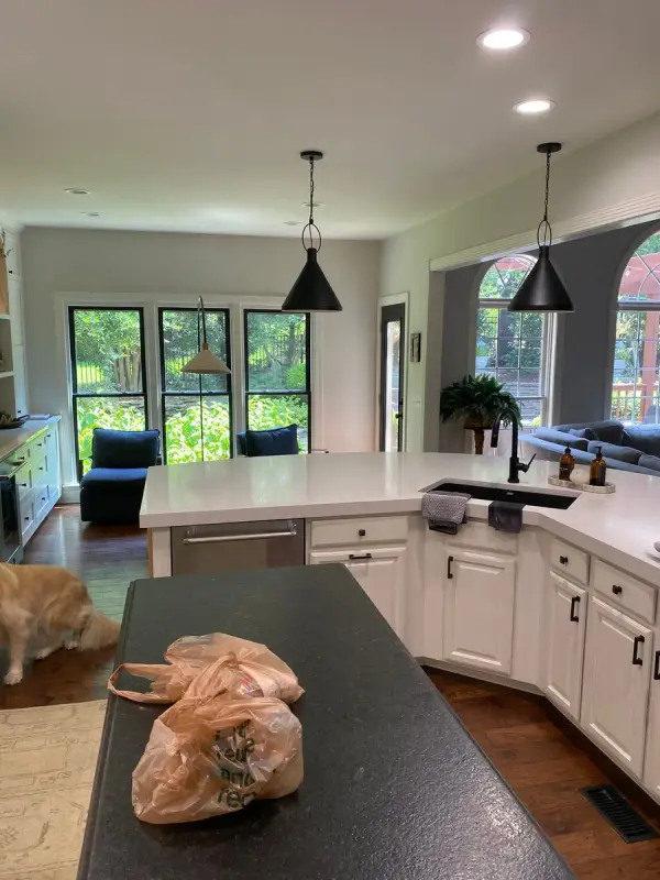 Kitchen with white cabinets and black pendant lights, Franklin, TN