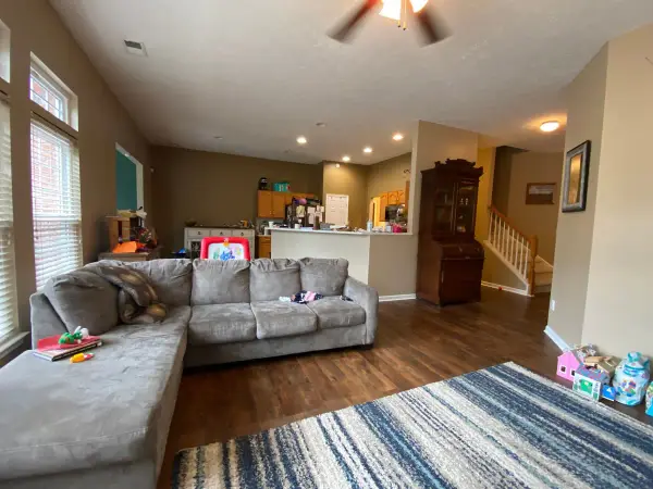 Family room with tan walls and a ceiling fan, Bellevue, TN