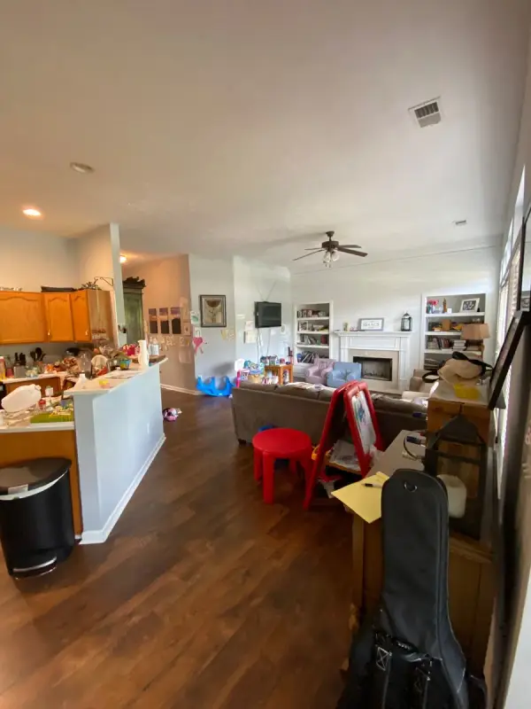 Family room with light gray walls, toys on the floor, Bellevue, TN