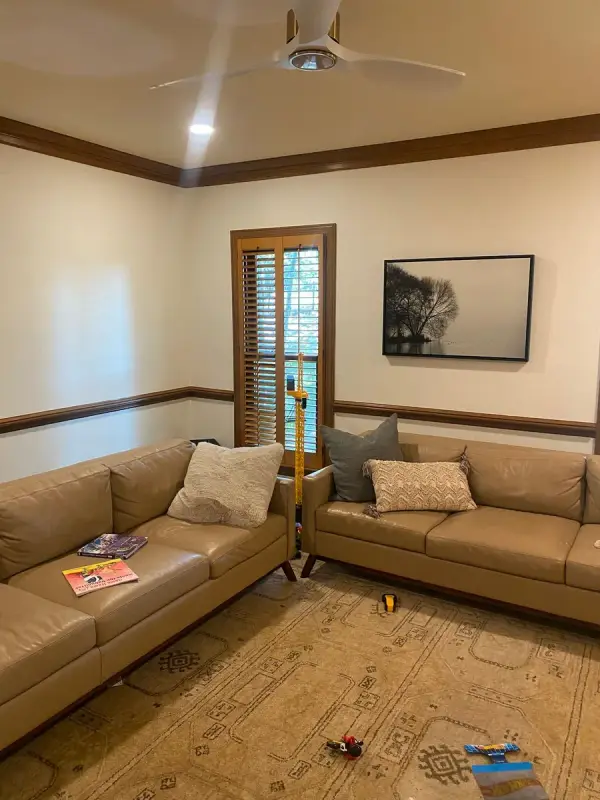 Family room corner with stained crown molding and chair rail, Brentwood, TN