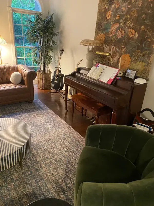 Sitting room with a piano under a tall arched window, Franklin, TN