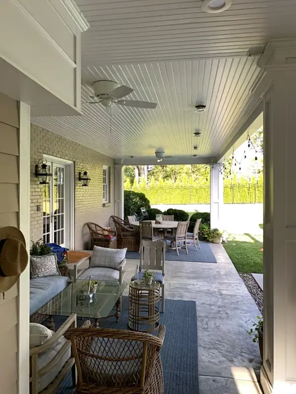 Covered porch with beadboard ceiling, fans and wicker seating, Belle Meade, TN