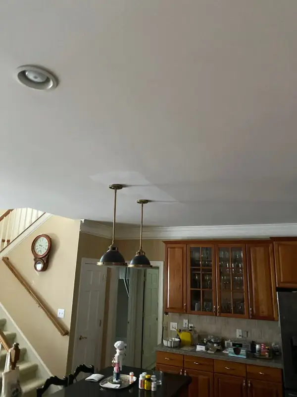 Stair landing beside a kitchen with stained wood cabinets, Belle Meade, TN