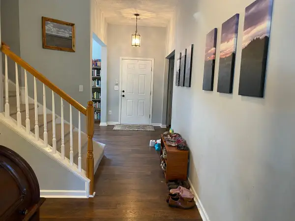 White-spindled stair and gray walls toward the front door, Bellevue, TN