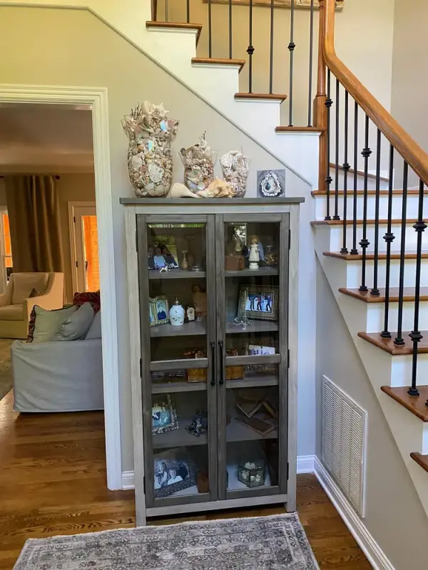 Iron-baluster staircase above a white doorway, Brentwood, TN